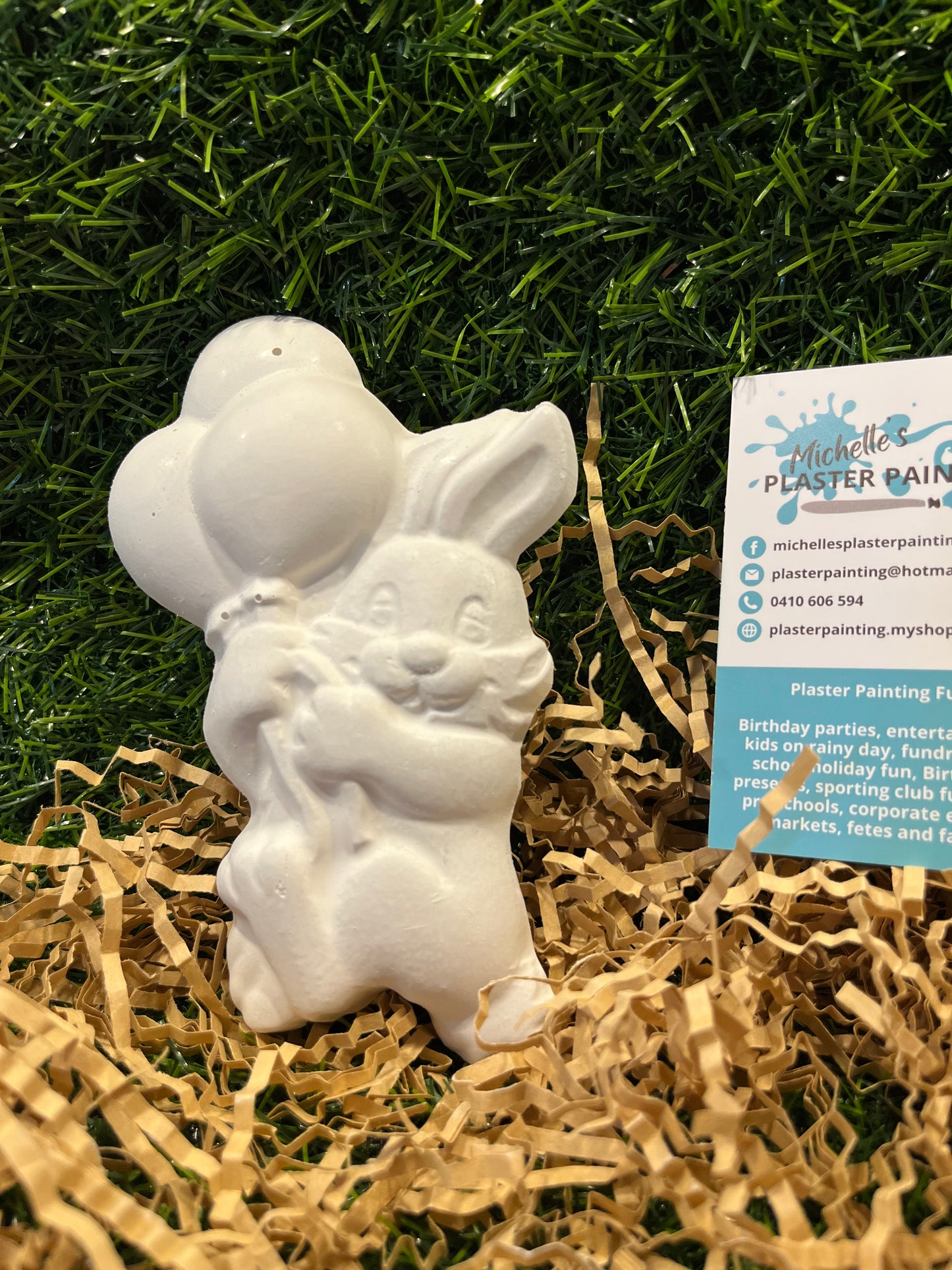 Easter Bunny holding Balloons